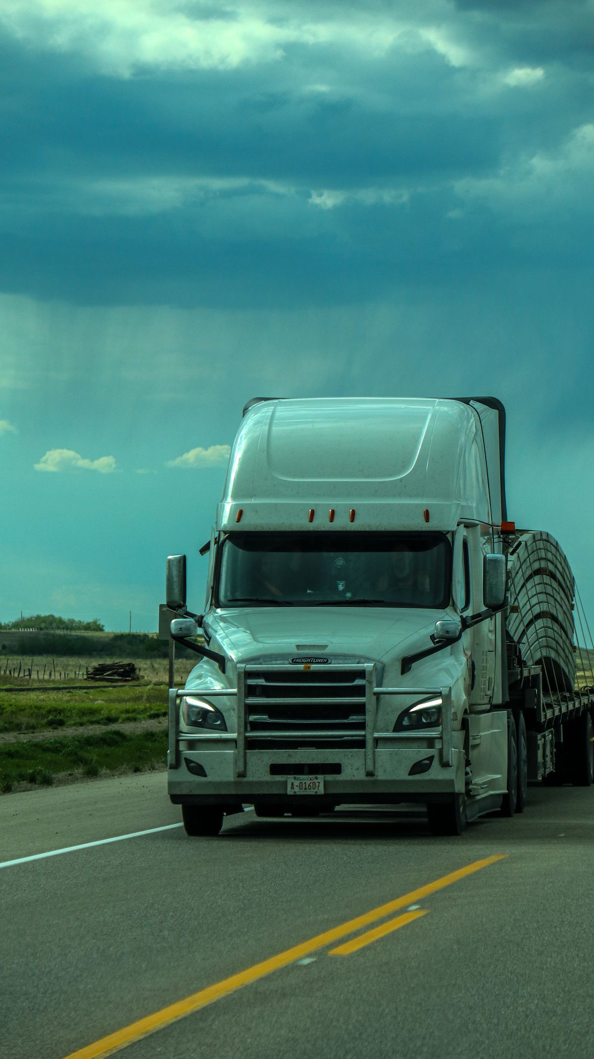 An articulated trailer truck on a highway