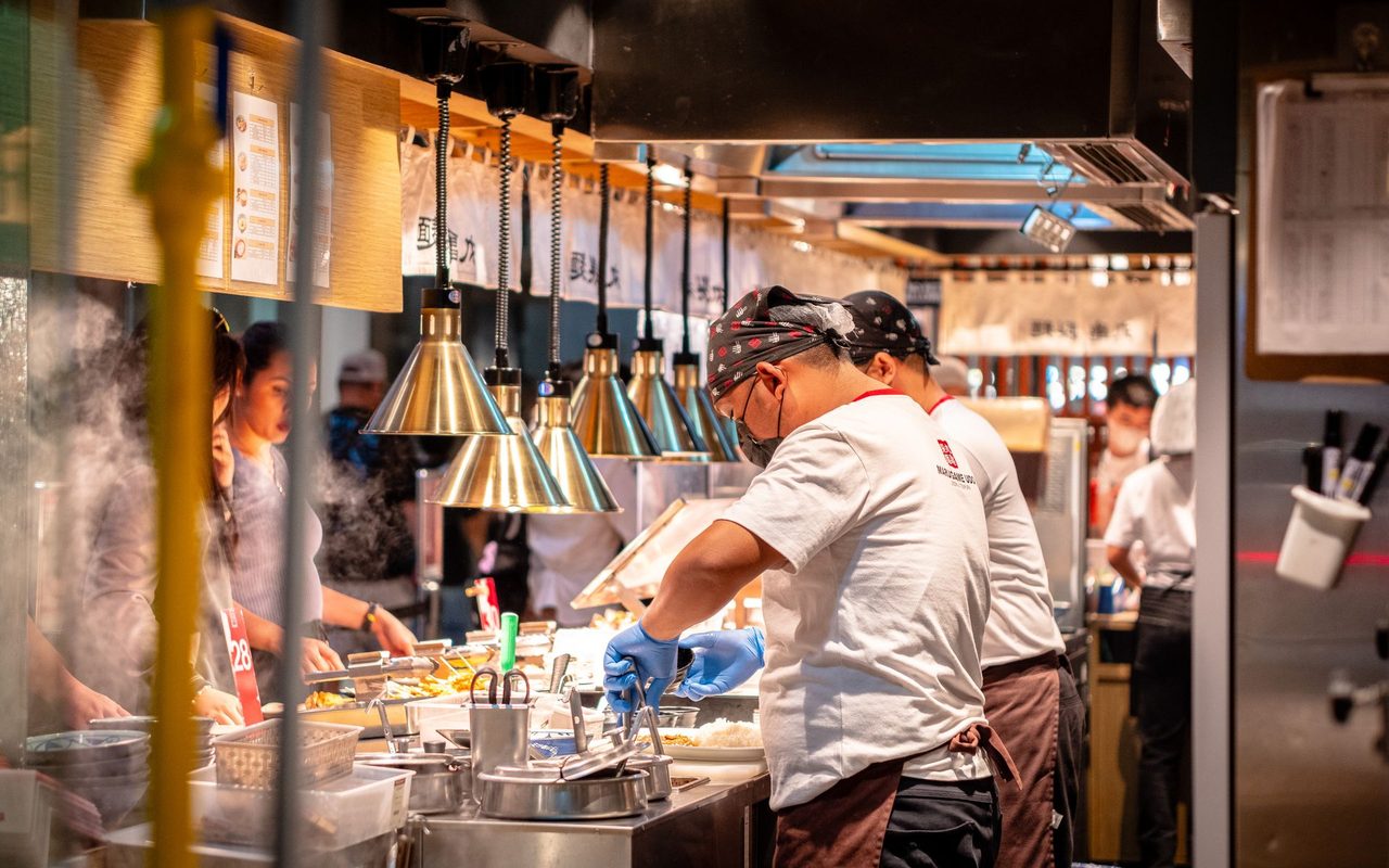 Cooks at work in a restaurant kitchen in Metro Manila